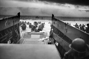 A landing craft from the U.S. Coast Guard-manned USS Samuel Chase disembarks troops of Company A, 16th Infantry, 1st Infantry Division (the Big Red One) onto Omaha Beach on June 6, 1944. A landing craft from the U.S. Coast Guard-manned USS Samuel Chase disembarks troops of Company A, 16th Infantry, 1st Infantry Division (the Big Red One) onto Omaha Beach on June 6, 1944.