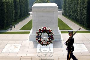 A soldier assigned to the Army's 3rd U.S. Infantry Regiment, "The Old Guard," guards the Tomb of the Unknowns at Arlington National Cemetery, Virginia. A soldier assigned to the Army's 3rd U.S. Infantry Regiment, "The Old Guard," guards the Tomb of the Unknowns at Arlington National Cemetery, Virginia.