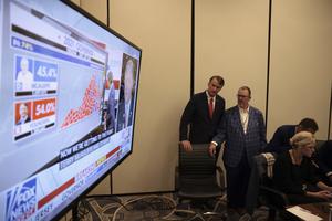 Glenn Youngkin his strategist Jeff Roe watch election results come in for the Virginia gubernatorial race at the Westfields Marriott Washington Dulles on Nov. 2 in Chantilly, Virginia. Glenn Youngkin his strategist Jeff Roe watch election results come in for the Virginia gubernatorial race at the Westfields Marriott Washington Dulles on Nov. 2 in Chantilly, Virginia.