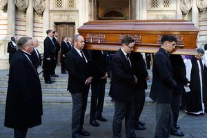 Pallbearers carry the casket of Conservative MP David Amess after a requiem mass at Westminster Cathedral in London on November 23, 2021. Pallbearers carry the casket of Conservative MP David Amess after a requiem mass at Westminster Cathedral in London on November 23, 2021.