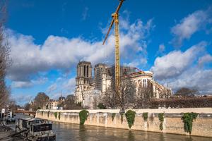 Panoramic view of Notre-Dame de Paris being restored after the cathedral caught fire, destroying the spire and the oak frame and lead roof. Panoramic view of Notre-Dame de Paris being restored after the cathedral caught fire, destroying the spire and the oak frame and lead roof.