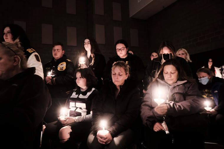 Students, parents, teachers and community members gather for a vigil at Lake Point Community Church following a shooting at Oxford High School on Nov. 30 in Oxford, Michigan. Catholic clergy also prayed with the community. Four people were killed and six others wounded by the alleged shooter, a 15-year-old student who is now in police custody. Students, parents, teachers and community members gather for a vigil at Lake Point Community Church following a shooting at Oxford High School on Nov. 30 in Oxford, Michigan. Catholic clergy also prayed with the community. Four people were killed and six others wounded by the alleged shooter, a 15-year-old student who is now in police custody.