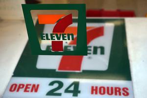 A sign for a 7-Eleven convenience store is seen at a store in Sydney on Sept. 1, 2015. A sign for a 7-Eleven convenience store is seen at a store in Sydney on Sept. 1, 2015.
