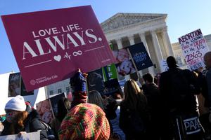 Pro-life protesters demonstrate in front of the Supreme Court in Washington, DC, on December 1, 2021. Pro-life protesters demonstrate in front of the Supreme Court in Washington, DC, on December 1, 2021.