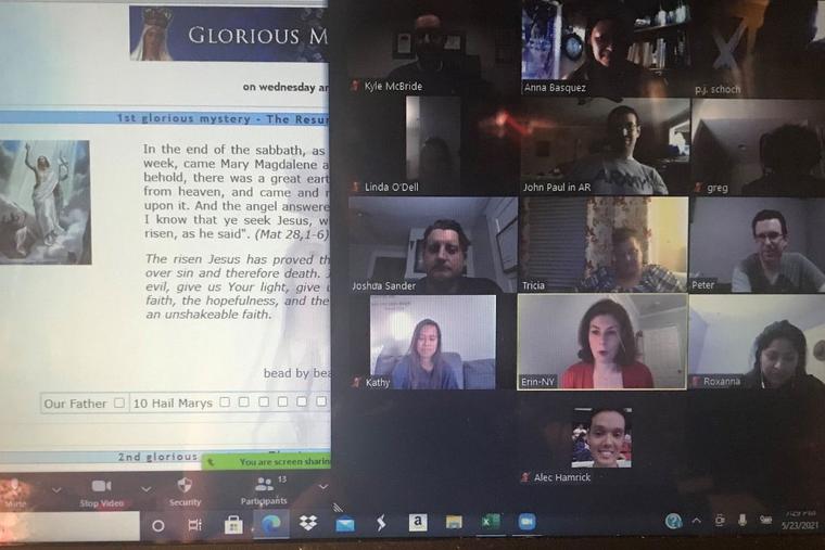Participants pray the Rosary together online in May 2021. Participants pray the Rosary together online in May 2021.