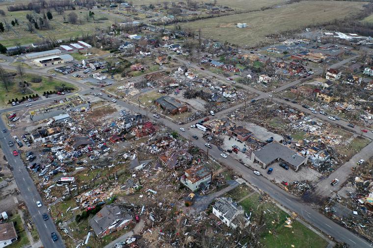 An aerial view is shown of homes and businesses destroyed by a tornado on Dec. 11 in Mayfield, Kentucky. Multiple tornadoes touched down in several Midwestern states late Friday evening and early Saturday, causing widespread destruction and leaving an estimated 70-plus people dead. An aerial view is shown of homes and businesses destroyed by a tornado on Dec. 11 in Mayfield, Kentucky. Multiple tornadoes touched down in several Midwestern states late Friday evening and early Saturday, causing widespread destruction and leaving an estimated 70-plus people dead.