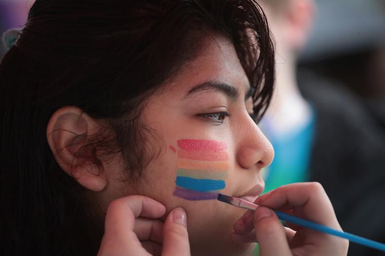 A student gets a rainbow painted on her face at the Columbus Pride Festival on April 14, 2018, in Columbus, Indiana, the hometown of Vice President Mike Pence. The festival was organized by high school senior Erin Bailey. A student gets a rainbow painted on her face at the Columbus Pride Festival on April 14, 2018, in Columbus, Indiana, the hometown of Vice President Mike Pence. The festival was organized by high school senior Erin Bailey.