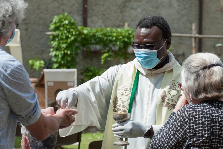 Priest celebrates the Mass amid the COVID pandemic. Priest celebrates the Mass amid the COVID pandemic.