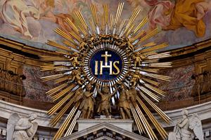The IHS monogram on the main altar of the Gesù in Rome The IHS monogram on the main altar of the Gesù in Rome