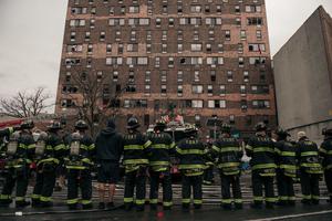 Emergency first responders remain at the scene after an intense fire at a 19-story residential building that erupted in the morning on January 9, 2022 in the Bronx borough of New York City. Reports indicate over 50 people were injured. Emergency first responders remain at the scene after an intense fire at a 19-story residential building that erupted in the morning on January 9, 2022 in the Bronx borough of New York City. Reports indicate over 50 people were injured.