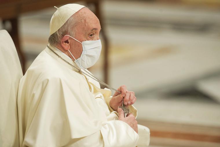 Pope Francis, wearing a protective mask against COVID-19, celebrates a Mass during the first vespers and Te Deum prayer in St. Peter's Basilica at the Vatican on Dec. 31, 2021, in Vatican City, Vatican. Pope Francis, wearing a protective mask against COVID-19, celebrates a Mass during the first vespers and Te Deum prayer in St. Peter's Basilica at the Vatican on Dec. 31, 2021, in Vatican City, Vatican.