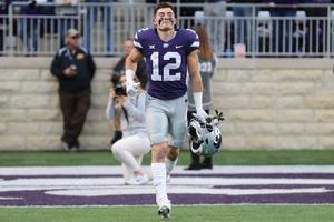 Football player Landry Weber walks onto the field. Football player Landry Weber walks onto the field.