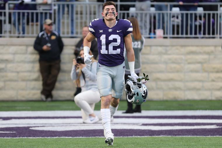 Football player Landry Weber walks onto the field. Football player Landry Weber walks onto the field.