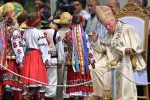 Pope St. John Paul II blesses Ukrainian children after offering Mass at Chaika Airfield outside Kyiv, June 25, 2001. Pope St. John Paul II blesses Ukrainian children after offering Mass at Chaika Airfield outside Kyiv, June 25, 2001.