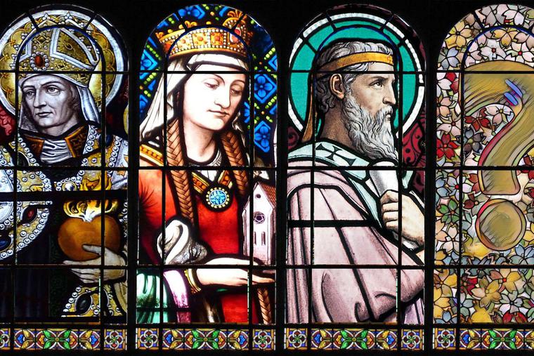 L to R: St. Augustine of Hippo, window in Southwark Cathedral, London, photo by Vassil; St. Hildegard of Bingen, photo by Wolfgang Sauber; St. Irenaeus of Lyons, window crafted by Lucien Bégule, photo by Gérald Gambier. L to R: St. Augustine of Hippo, window in Southwark Cathedral, London, photo by Vassil; St. Hildegard of Bingen, photo by Wolfgang Sauber; St. Irenaeus of Lyons, window crafted by Lucien Bégule, photo by Gérald Gambier.