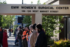 Pro-life demonstrators stand in front of the EMW Womens Surgical Center, an abortion clinic, on May 8, 2021 in Louisville, Kentucky. Pro-life demonstrators stand in front of the EMW Womens Surgical Center, an abortion clinic, on May 8, 2021 in Louisville, Kentucky.