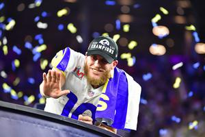 Los Angeles Rams’ Cooper Kupp waves to his family after winning Super Bowl LVI between the Los Angeles Rams and the Cincinnati Bengals at SoFi Stadium in Inglewood, California, on Feb. 13. Los Angeles Rams’ Cooper Kupp waves to his family after winning Super Bowl LVI between the Los Angeles Rams and the Cincinnati Bengals at SoFi Stadium in Inglewood, California, on Feb. 13.