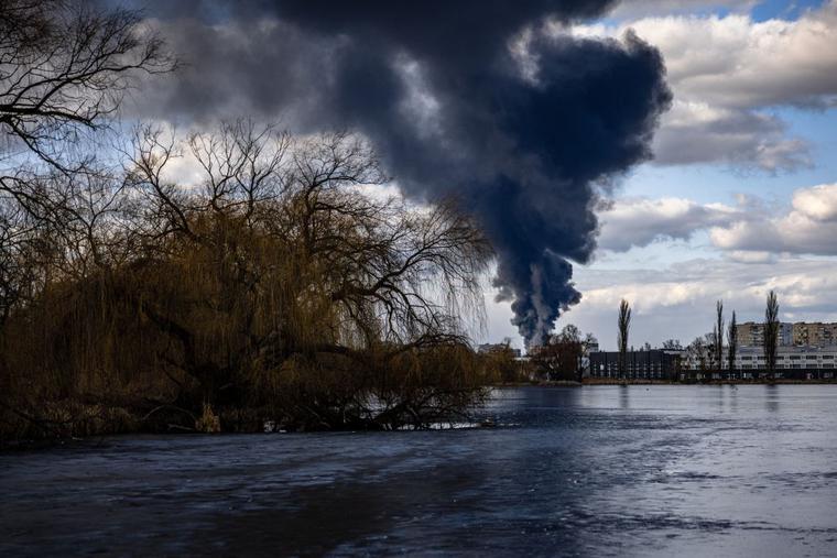 Smoke billows over the town of Vasylkiv just outside Kyiv on Feb. 27, after overnight Russian strikes hit an oil depot. Ukraine's foreign minister said Feb. 27 that Kyiv would not buckle at talks with Russia over its invasion, accusing President Vladimir Putin of seeking to increase "pressure" by ordering his nuclear forces on high alert. Smoke billows over the town of Vasylkiv just outside Kyiv on Feb. 27, after overnight Russian strikes hit an oil depot. Ukraine's foreign minister said Feb. 27 that Kyiv would not buckle at talks with Russia over its invasion, accusing President Vladimir Putin of seeking to increase "pressure" by ordering his nuclear forces on high alert.