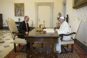 Russian president Vladimir Putin with Pope Francis in Vatican City, during a papal audience with Pope Francis on June 10, 2015. The discussion between President Putin and Pope Francis focused on the crises in both Ukraine and the Middle East. Russian president Vladimir Putin with Pope Francis in Vatican City, during a papal audience with Pope Francis on June 10, 2015. The discussion between President Putin and Pope Francis focused on the crises in both Ukraine and the Middle East.