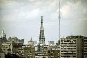 Two television broadcasting towers are seen on the Moscow skyline on Aug. 13, 2021. The Ostankinkino tower (r) was erected in 1967 to replace the obsolete Shukhov tower (l). Two television broadcasting towers are seen on the Moscow skyline on Aug. 13, 2021. The Ostankinkino tower (r) was erected in 1967 to replace the obsolete Shukhov tower (l).