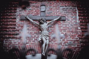 A crucifix hangs outside Bernardine Church and monastery in Lviv. A crucifix hangs outside Bernardine Church and monastery in Lviv.