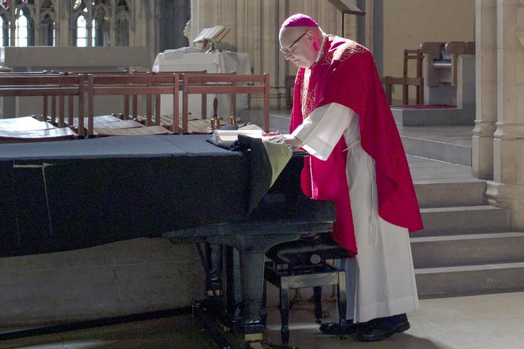 Archbishop John Wilson of Southwark, England, prepares to celebrate the Solemn Liturgy of the Passion on Good Friday in St. George’s Cathedral on April 10, 2020, in London. Archbishop John Wilson of Southwark, England, prepares to celebrate the Solemn Liturgy of the Passion on Good Friday in St. George’s Cathedral on April 10, 2020, in London.