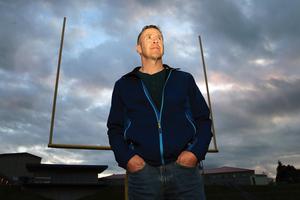 Former Bremerton High School assistant football coach Joe Kennedy stands on the field at Bremerton Memorial Stadium, Nov. 5, 2015. Former Bremerton High School assistant football coach Joe Kennedy stands on the field at Bremerton Memorial Stadium, Nov. 5, 2015.