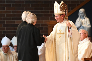 Bishop Andrew Cozzens greets members of the Diocese of Crookston at his Installation Mass, December 6, 2021. Bishop Andrew Cozzens greets members of the Diocese of Crookston at his Installation Mass, December 6, 2021.