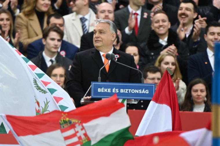 Hungarian Prime Minister Viktor Orban is applauded after giving a speech marking Hungary's Revolution and Independence Day on March 15, 2022 in front of the parliament building of Budapest. Hungarian Prime Minister Viktor Orban and opposition leader Peter Marki-Zay held separate mass rallies in Budapest ahead of an unpredictable parliamentary election scheduled for April 3, 2022. Hungarian Prime Minister Viktor Orban is applauded after giving a speech marking Hungary's Revolution and Independence Day on March 15, 2022 in front of the parliament building of Budapest. Hungarian Prime Minister Viktor Orban and opposition leader Peter Marki-Zay held separate mass rallies in Budapest ahead of an unpredictable parliamentary election scheduled for April 3, 2022.
