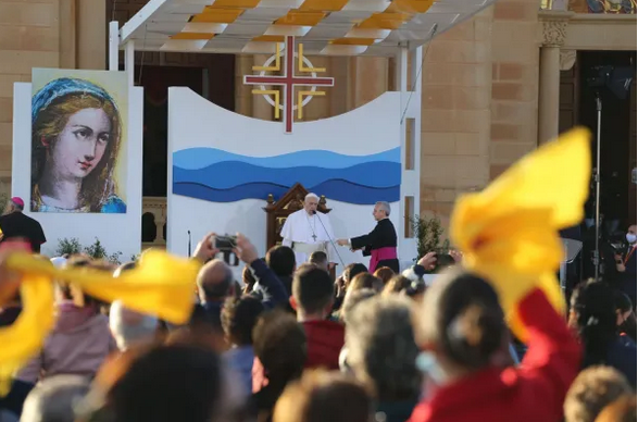 Pope Francis addresses the crowd gathered outside the Basilica of the National Shrine of the Blessed Virgin of Ta’ Pinu on the Maltese island of Gozo on April 2. Pope Francis addresses the crowd gathered outside the Basilica of the National Shrine of the Blessed Virgin of Ta’ Pinu on the Maltese island of Gozo on April 2.