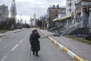 An elderly woman cries as she walks the street next to a destroyed building Monday in Bucha, Ukraine. The Ukrainian government has accused Russian forces of committing a “deliberate massacre” as they occupied and eventually retreated from Bucha, 15 miles northwest of Kyiv. Dozens of bodies have been found in the days since Ukrainian forces regained control of the town. An elderly woman cries as she walks the street next to a destroyed building Monday in Bucha, Ukraine. The Ukrainian government has accused Russian forces of committing a “deliberate massacre” as they occupied and eventually retreated from Bucha, 15 miles northwest of Kyiv. Dozens of bodies have been found in the days since Ukrainian forces regained control of the town.