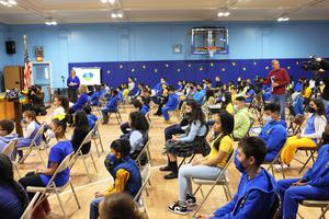 Students participate in a prayer service March 28 in the gymnasium of St. Brendan Catholic School in New York City. Students participate in a prayer service March 28 in the gymnasium of St. Brendan Catholic School in New York City.
