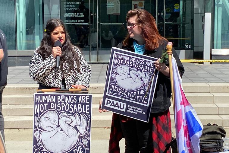 Lauren Handy (r) and Terrisa Bukovinac (l) speak and hold signs April 8 outside the D.C. medical examiner’s office after it received the remains of the five largest aborted babies the group found in a medical-waste box. Lauren Handy (r) and Terrisa Bukovinac (l) speak and hold signs April 8 outside the D.C. medical examiner’s office after it received the remains of the five largest aborted babies the group found in a medical-waste box.