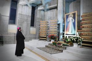 Archbishop Jan Pawłowski, a member of the Vatican's Secretariat of State, prays before an image of Divine Mercy on the 90th anniversary of the apparition at the Divine Mercy Sanctuary in Płock, Poland, Feb. 22, 2021. Archbishop Jan Pawłowski, a member of the Vatican's Secretariat of State, prays before an image of Divine Mercy on the 90th anniversary of the apparition at the Divine Mercy Sanctuary in Płock, Poland, Feb. 22, 2021.