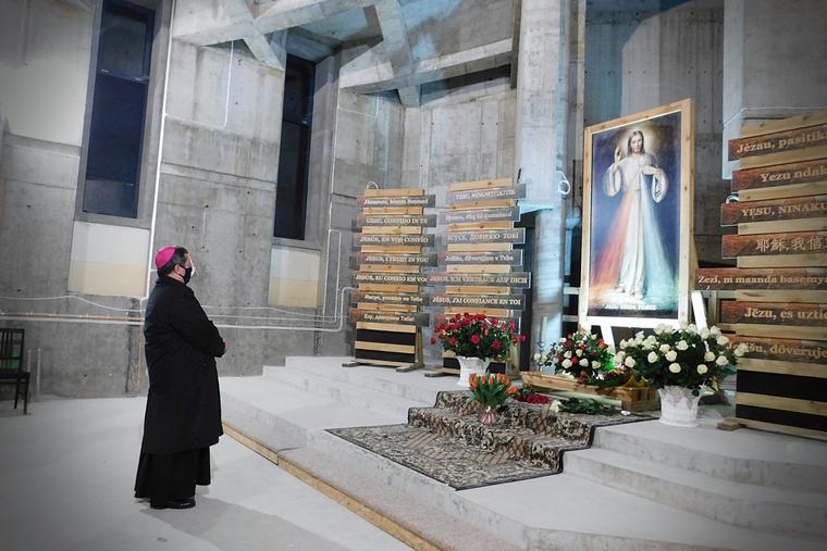 Archbishop Jan Pawłowski, a member of the Vatican's Secretariat of State, prays before an image of Divine Mercy on the 90th anniversary of the apparition at the Divine Mercy Sanctuary in Płock, Poland, Feb. 22, 2021. Archbishop Jan Pawłowski, a member of the Vatican's Secretariat of State, prays before an image of Divine Mercy on the 90th anniversary of the apparition at the Divine Mercy Sanctuary in Płock, Poland, Feb. 22, 2021.