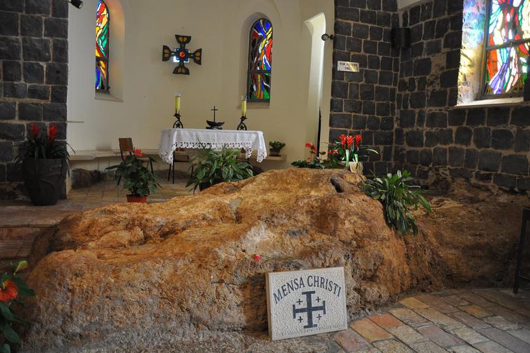 The Mensa Christi rock in the Church of the Primacy of St. Peter is said to be where Jesus laid out a breakfast of bread and fish for the apostles. The Mensa Christi rock in the Church of the Primacy of St. Peter is said to be where Jesus laid out a breakfast of bread and fish for the apostles.