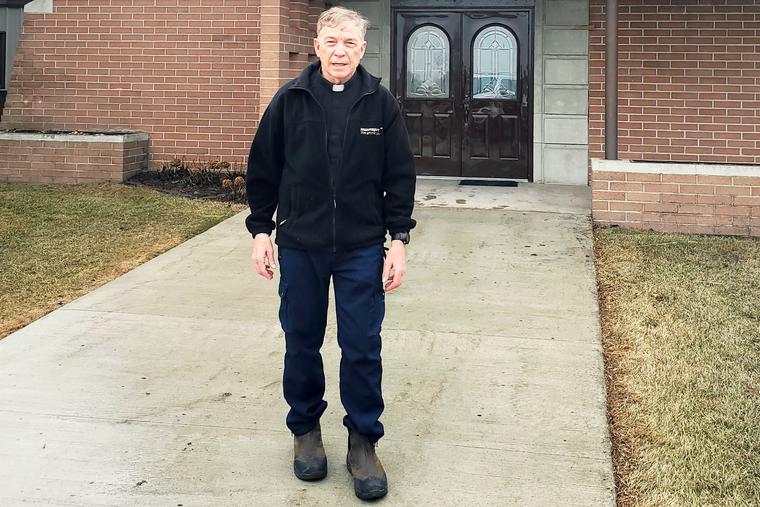 Father Dale Kinzler emerges from the church “device-free” after leading the Stations of the Cross on March 29 at St. Lawrence Catholic Church in Jessie, North Dakota, just two miles west of the accident site. Father Dale Kinzler emerges from the church “device-free” after leading the Stations of the Cross on March 29 at St. Lawrence Catholic Church in Jessie, North Dakota, just two miles west of the accident site.