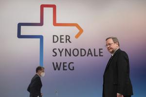 Bishop Georg Bätzing of Limburg and President of the Synodal Way and Chairman of the German Bishops' Conference, walks across the stage during a press statement at the beginning of the Third Synodal Assembly of German Catholics February 3, 2022. Bishop Georg Bätzing of Limburg and President of the Synodal Way and Chairman of the German Bishops' Conference, walks across the stage during a press statement at the beginning of the Third Synodal Assembly of German Catholics February 3, 2022.