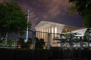 The Supreme Court is seen past un-scalable fencing in Washington, DC, early on May 5, 2022. The Supreme Court is seen past un-scalable fencing in Washington, DC, early on May 5, 2022.