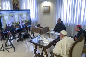 Pope Francis, with Cardinal Kurt Koch, prefect of the Vatican’s Pontifical Council for Promoting Christian Unity (r), and a translator attend a video call with Russian Orthodox Patriarch Kirill, at right on the monitor, and Metropolitan Hilarion, March 16. Pope Francis, with Cardinal Kurt Koch, prefect of the Vatican’s Pontifical Council for Promoting Christian Unity (r), and a translator attend a video call with Russian Orthodox Patriarch Kirill, at right on the monitor, and Metropolitan Hilarion, March 16.