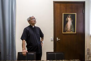 In this picture taken on Sept. 11, 2020, Cardinal Joseph Zen, former bishop of Hong Kong, poses for a photo at his residence during an interview with AFP in Hong Kong. He was arrested and released on bail last week. In this picture taken on Sept. 11, 2020, Cardinal Joseph Zen, former bishop of Hong Kong, poses for a photo at his residence during an interview with AFP in Hong Kong. He was arrested and released on bail last week.