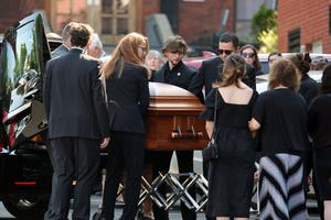 The casket of Roberta Drury, the youngest of those killed during the mass shooting at the Buffalo Tops supermarket on May 14th, is brought into Assumption Church on May 21, 2022 in Syracuse, New York. The casket of Roberta Drury, the youngest of those killed during the mass shooting at the Buffalo Tops supermarket on May 14th, is brought into Assumption Church on May 21, 2022 in Syracuse, New York.