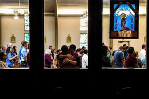 People gather at the Sacred Heart Catholic Church to pray for the victims of the mass shooting at Robb Elementary School in Uvalde, Texas on May 25, 2022. People gather at the Sacred Heart Catholic Church to pray for the victims of the mass shooting at Robb Elementary School in Uvalde, Texas on May 25, 2022.