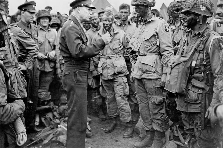 Gen. Dwight Eisenhower addresses troops prior to D Day, June 6, 1944. Gen. Dwight Eisenhower addresses troops prior to D Day, June 6, 1944.