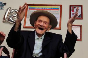112-year-old Venezuelan farmer Vicente Pérez gestures at his home in San Jose de Bolivar, Tachira state, Venezuela, on January 24, 2022. -Perez has been officially recognized as the oldest living man. 112-year-old Venezuelan farmer Vicente Pérez gestures at his home in San Jose de Bolivar, Tachira state, Venezuela, on January 24, 2022. -Perez has been officially recognized as the oldest living man.