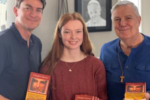Gary Kuntz, r, and Andy Kilman and his daughter, Maggie, feel blessed to share the Rosary with others. Gary Kuntz, r, and Andy Kilman and his daughter, Maggie, feel blessed to share the Rosary with others.