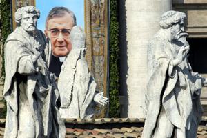 The tapestry of St. Josemaría Escrivá de Balaguer is displayed on a balcony display overlooking the altar in St. Peter's Square during his canonization ceremony on Oct. 6, 2002. More than 200,000 faithful attended the ceremony, which was presided over by Pope St. John Paul II. The tapestry of St. Josemaría Escrivá de Balaguer is displayed on a balcony display overlooking the altar in St. Peter's Square during his canonization ceremony on Oct. 6, 2002. More than 200,000 faithful attended the ceremony, which was presided over by Pope St. John Paul II.