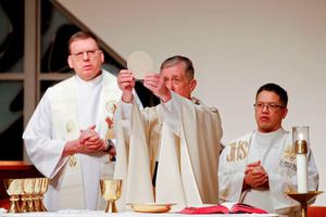 Cardinal Blase Cupich (C) presides over a Simbang Gabi Mass at the Old St. Mary's Catholic Church in Chicago, Illinois, on December 20, 2018. Cardinal Blase Cupich (C) presides over a Simbang Gabi Mass at the Old St. Mary's Catholic Church in Chicago, Illinois, on December 20, 2018.