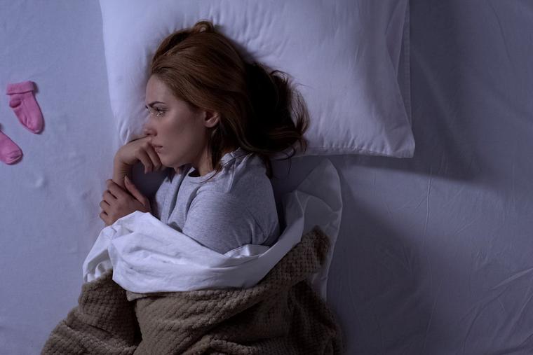 A woman regrets her abortion, keeping her from sleep. A woman regrets her abortion, keeping her from sleep.