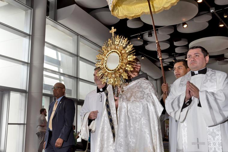 Archbishop Gregory Hartmayer of Atlanta leads the Eucharistic procession on the morning of June 18 at Atlanta's 25th Eucharistic Congress at the Georgia International Convention Center in College Park, Georgia. Archbishop Gregory Hartmayer of Atlanta leads the Eucharistic procession on the morning of June 18 at Atlanta's 25th Eucharistic Congress at the Georgia International Convention Center in College Park, Georgia.